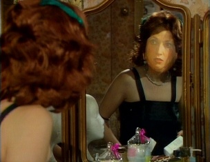 face in mirror